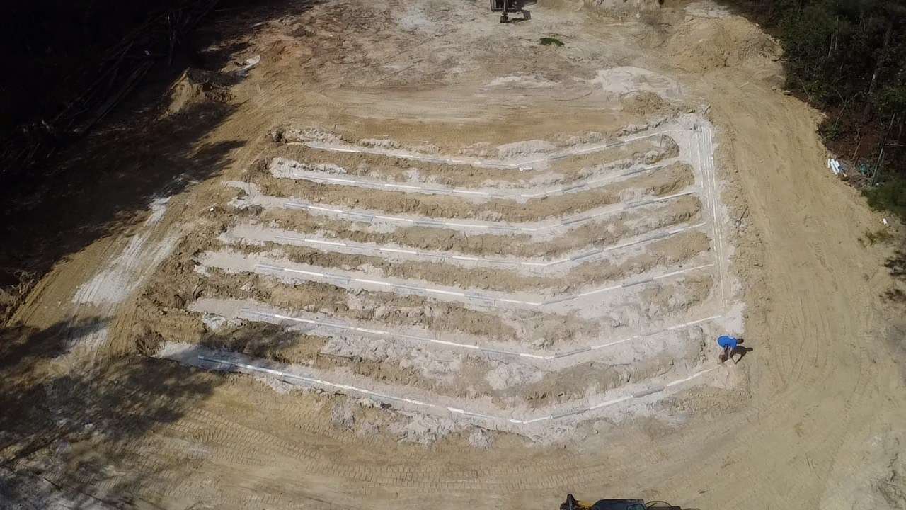 Overhead view of a large drain field during install